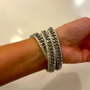 Leather and silver wrap bracelet.